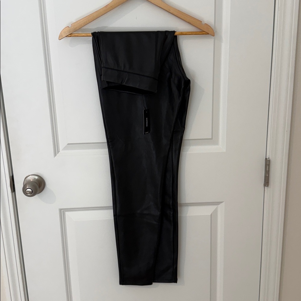 Express Black Women’s faux leather leggings